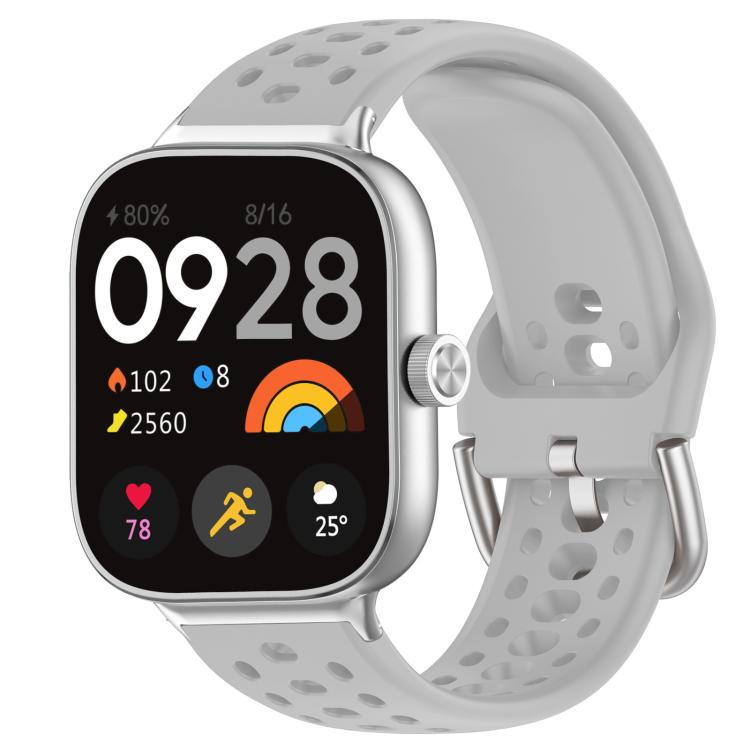 Light gray perforated silicone sport watch band with silver buckle on a smartwatch
