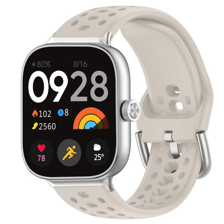 Pale gray perforated silicone sport watch band with silver buckle on a smartwatch