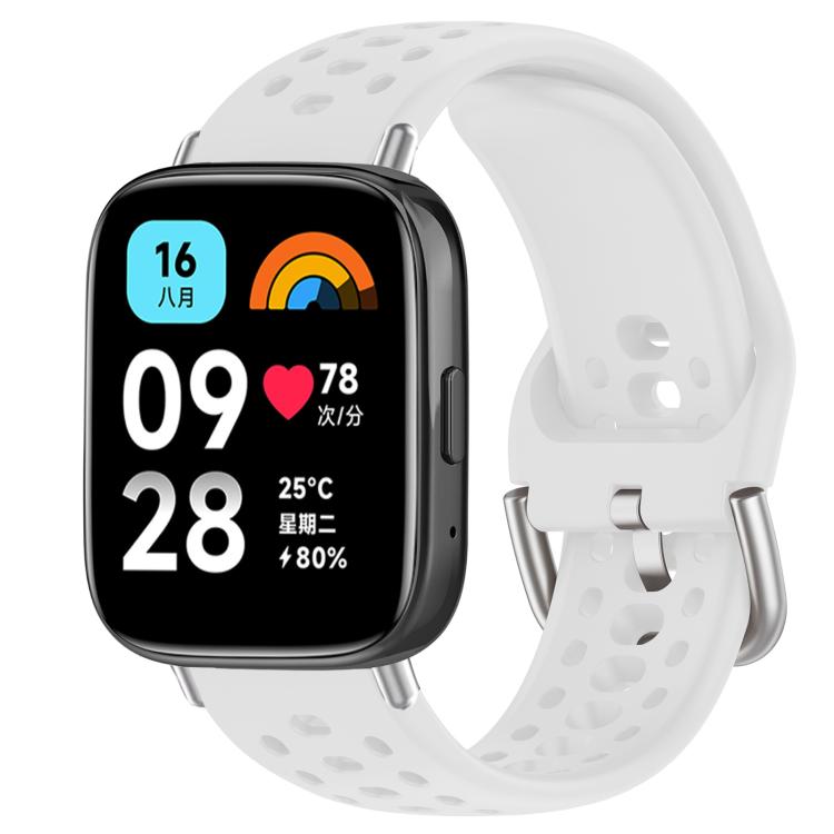 White perforated silicone sport watch band with silver buckle on a black smartwatch