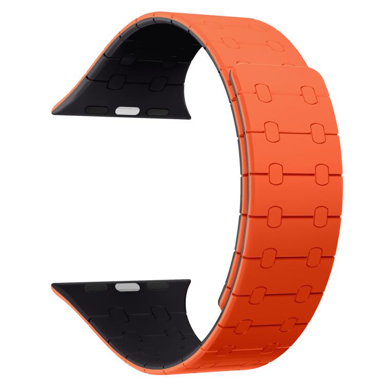 Orange and dark magnetic silicone watch band shown curved