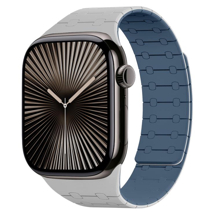 Apple Watch with a light gray and blue two-tone silicone band