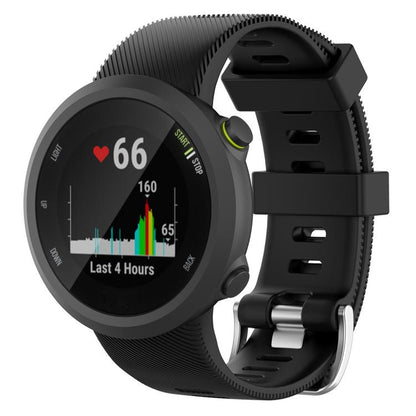 Black silicone watch band attached to a round sports watch, shown from the front.