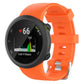 Bright orange silicone watch band with ribbed texture, shown attached to a round watch.