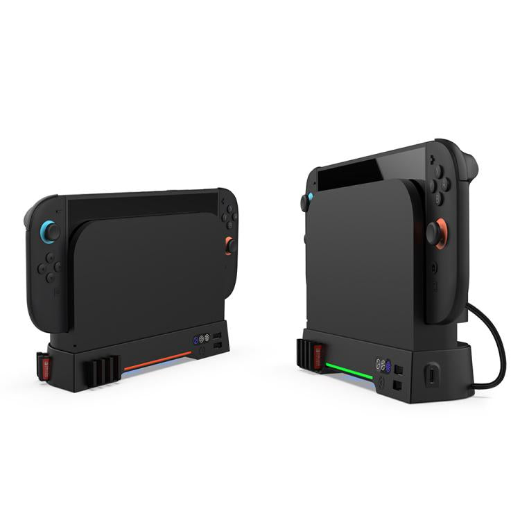 Black controller charging base with side controls, cables, and visible LED strip