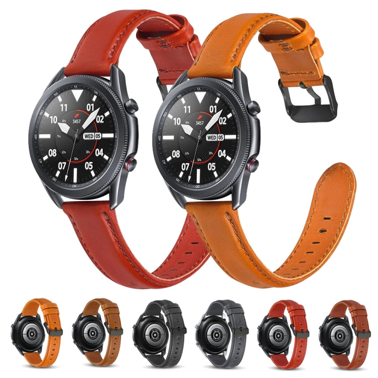 Assorted leather replacement watch straps in orange, red, and dark tones with metal buckles