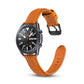 Orange leather watch strap with buckle and perforations, angled front view