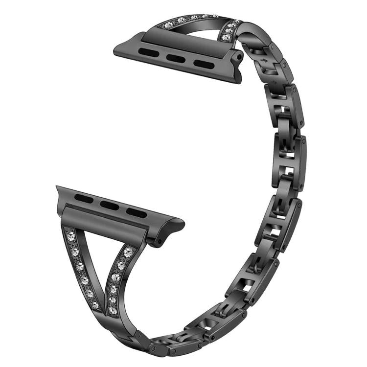 Black stainless steel watch band with crystal-set herringbone connectors, shown without a watch.
