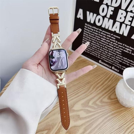 Apple Watch band with brown leather straps and gold V-shaped metal links