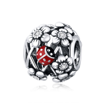 S925 sterling silver charm bead with ladybug and flower filigree, red enamel.