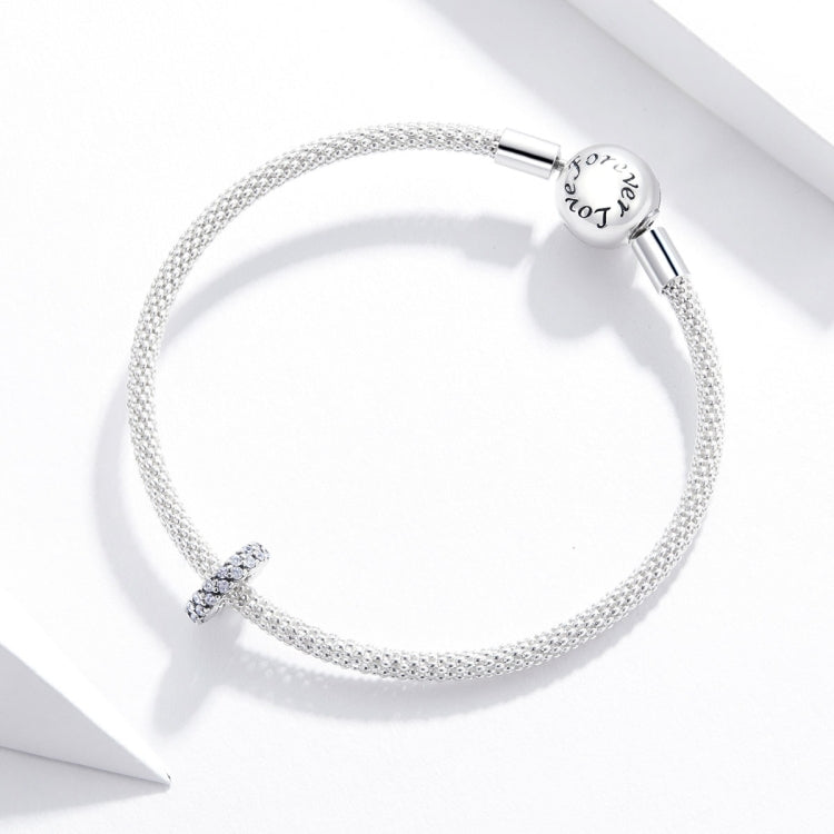 Silver mesh chain bracelet with engraved clasp and small circular pave CZ charm