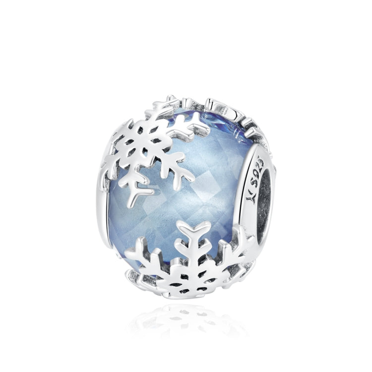 S925 sterling silver snowflake charm bead with blue glass center and cutout snowflakes