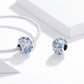 Silver chain bracelet with blue snowflake charm bead centerpiece