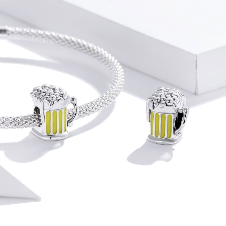 Silver chain bracelet with two beer mug charm beads, yellow enamel stripe front
