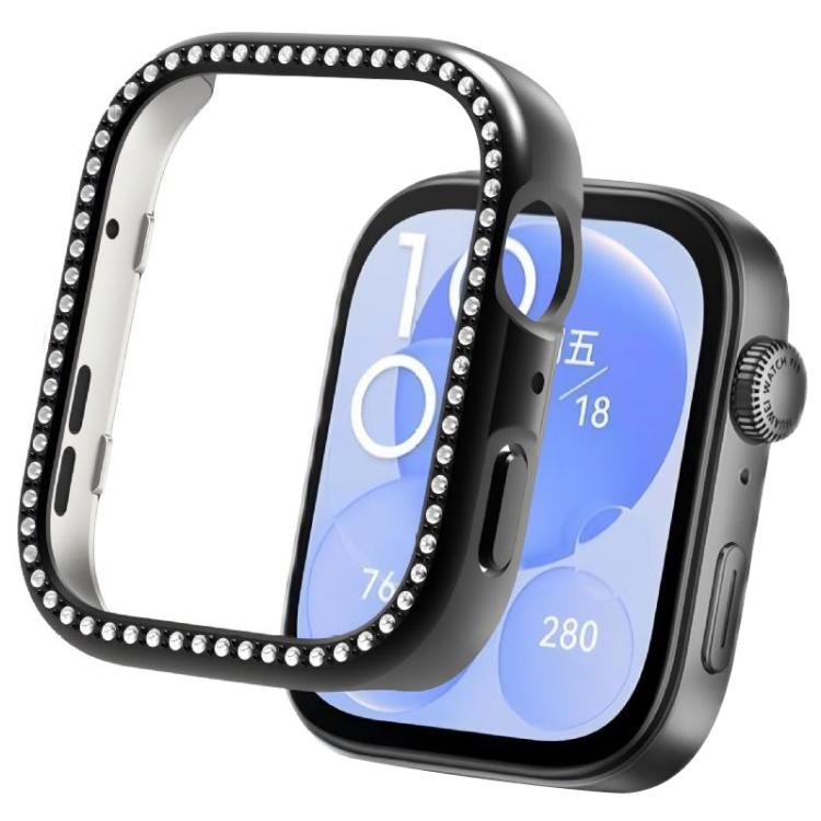 Black smartwatch protective cover with crystal trim, shown beside a watch