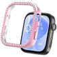 Pink smartwatch protective cover with crystal trim beside a watch