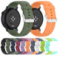 Silicone watch bands in assorted colors shown from the back, with metal buckles and adjustment holes.