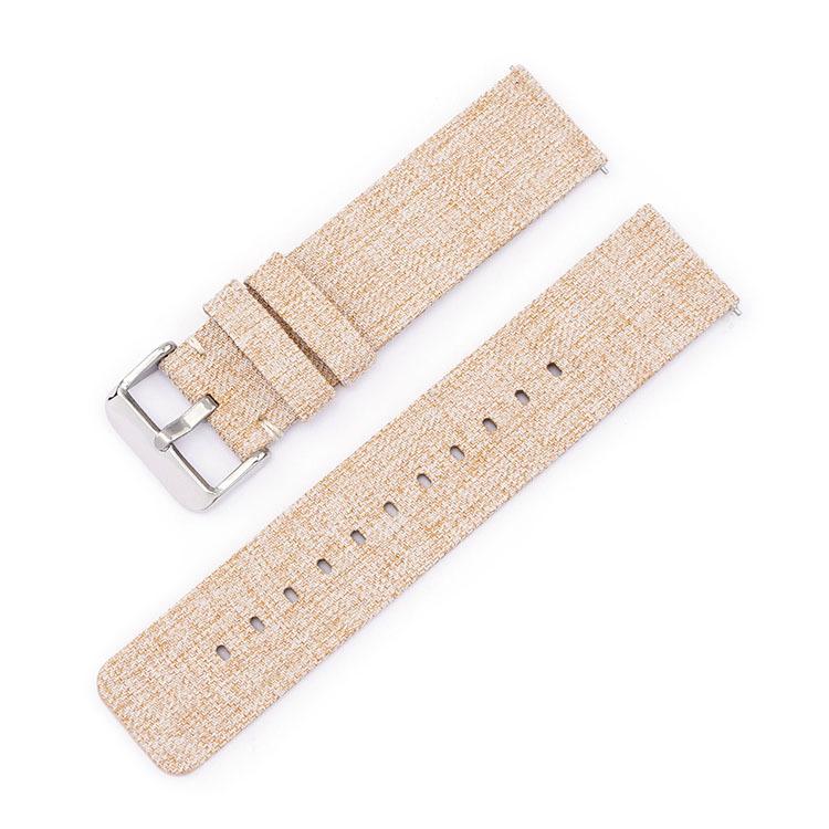 Beige woven nylon watch band with silver pin buckle and adjustment holes