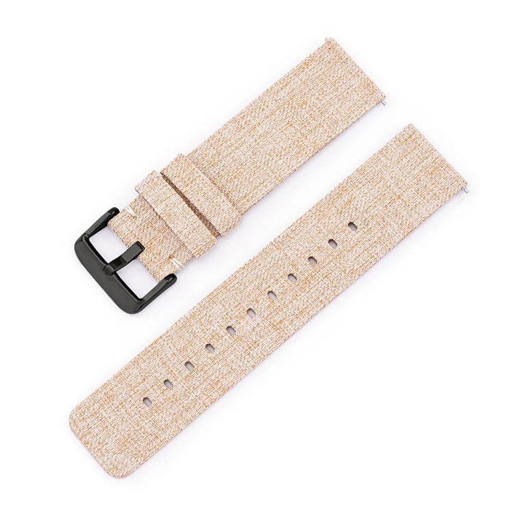 Beige woven nylon watch band with black pin buckle and adjustment holes