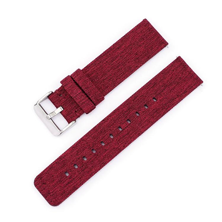 Red woven nylon watch band with silver pin buckle and adjustment holes
