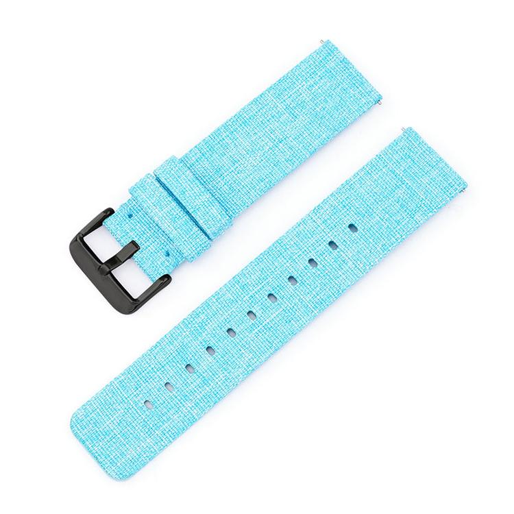 Light blue woven nylon watch band with black pin buckle and adjustment holes