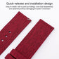 Red nylon watch band pair with quick-release pins and adjustment holes