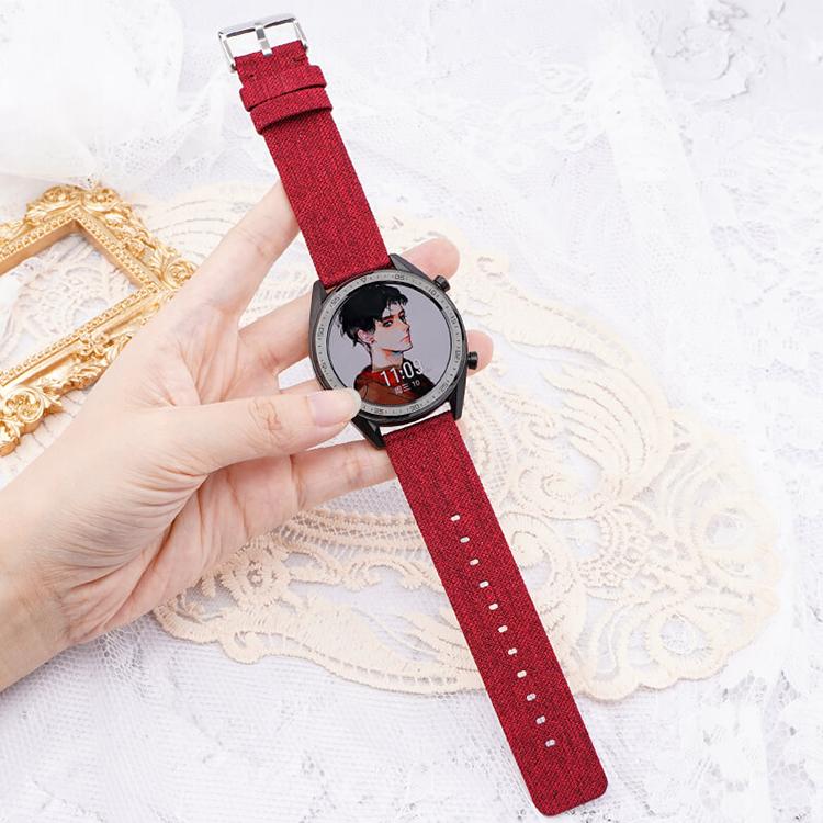 Red nylon watch band fitted to a round smartwatch