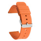Orange silicone watch band with a silver pin buckle and adjustment holes