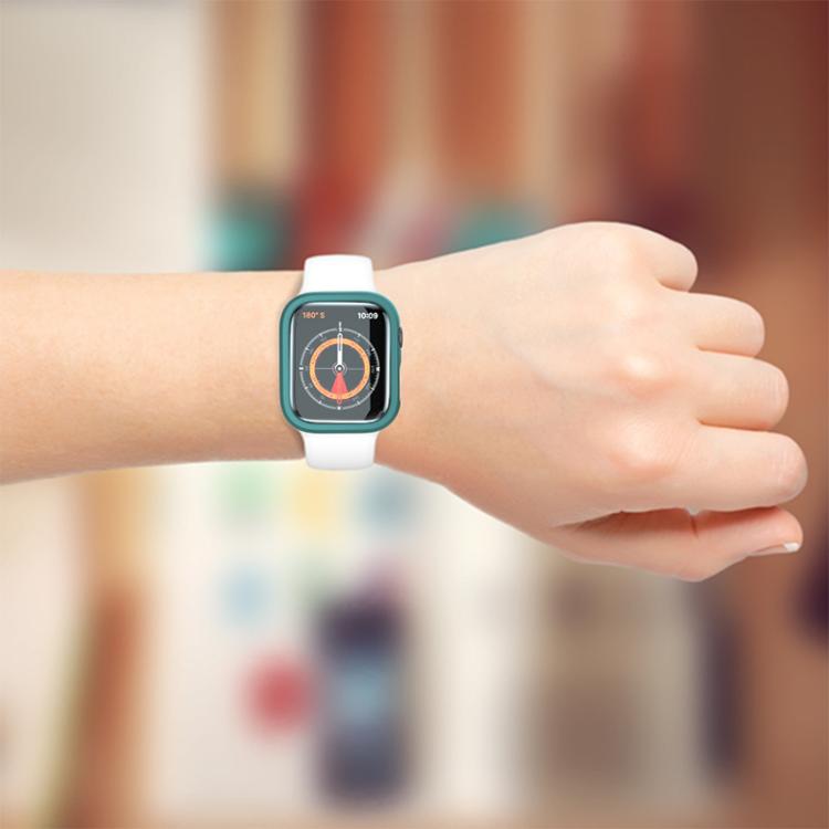Smartwatch with a teal half-coverage case and white band worn on a wrist