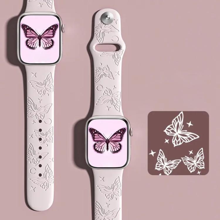xDfind pale pink silicone watch band with engraved butterflies, shown on an Apple Watch