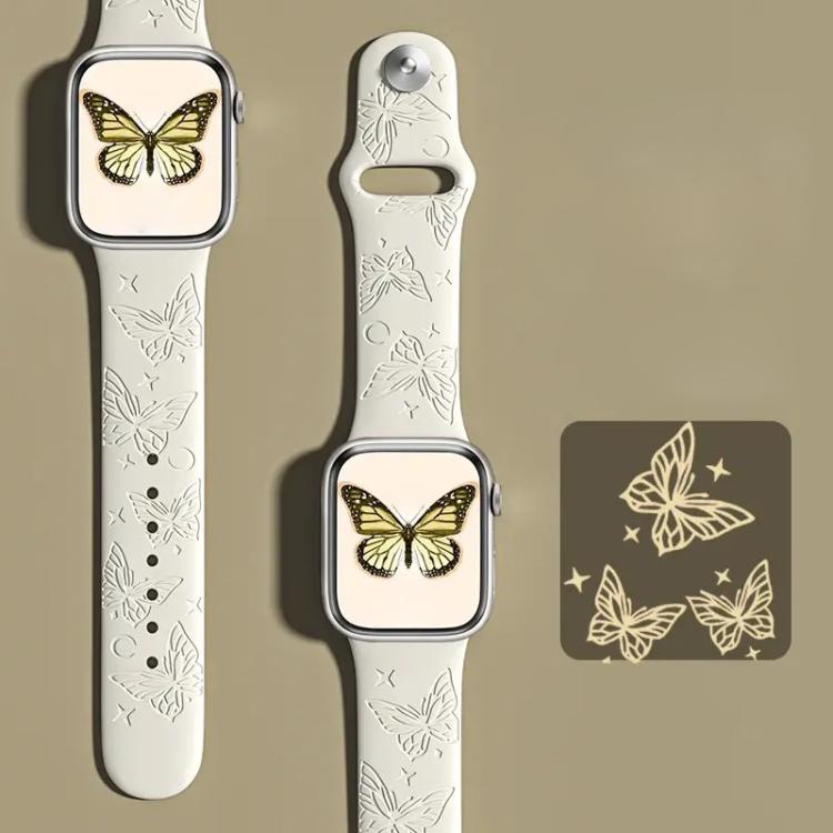 xDfind ivory silicone watch band with engraved butterflies, shown on an Apple Watch