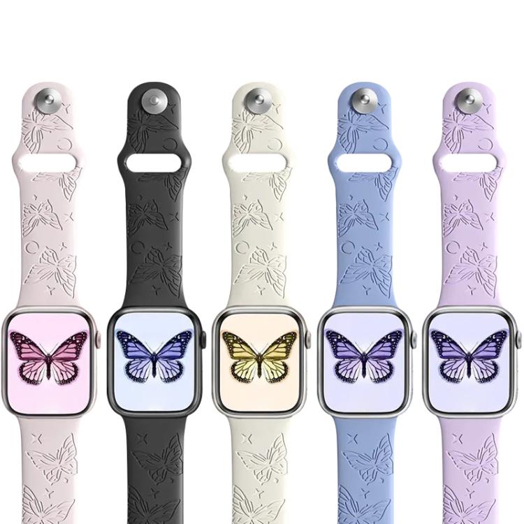Five silicone Apple Watch bands with engraved butterflies, shown in pink, black, cream, blue and purple.