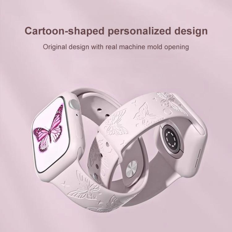 Pale pink silicone Apple Watch band with engraved butterflies, shown from the reverse side.