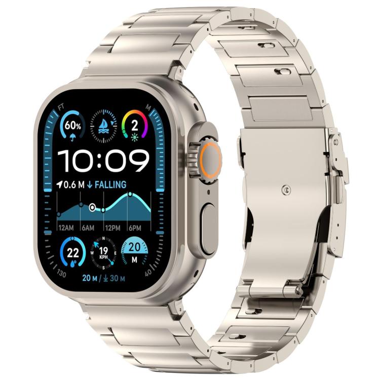 Titanium-tone metal link Apple Watch band with quick-release clasp, shown on a smartwatch