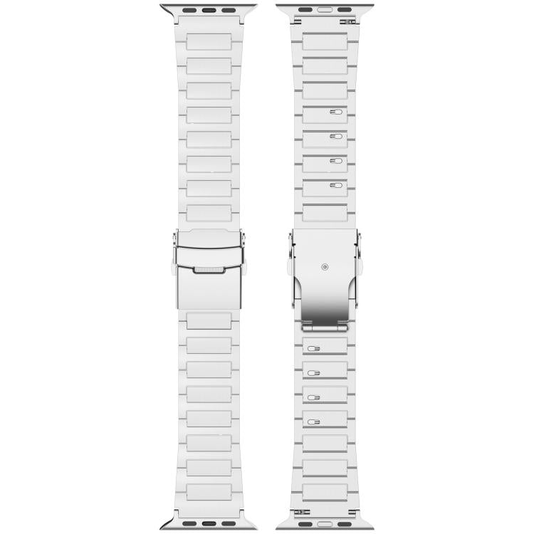 Metal link Apple Watch band shown from front and back, with quick-release clasp and fitted ends
