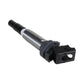 Ignition coil with black mounting bracket and gray body, side view