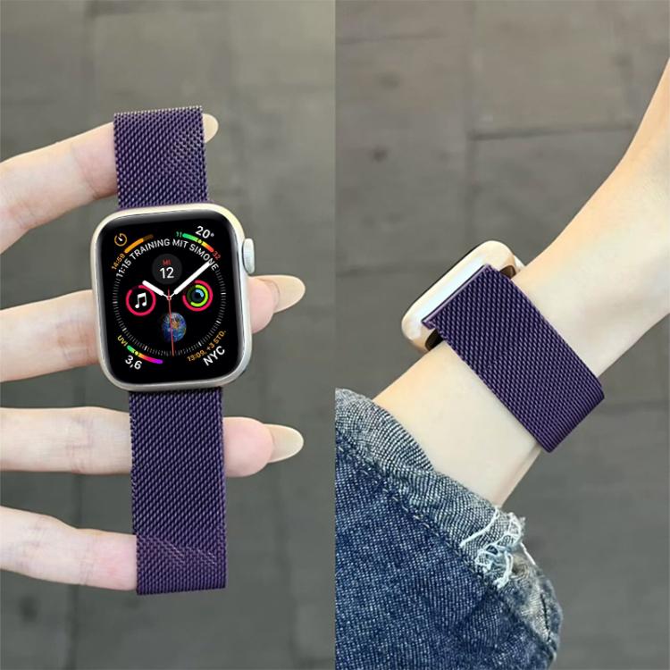 Purple Milanese stainless steel watch band shown held upright and worn on a wrist