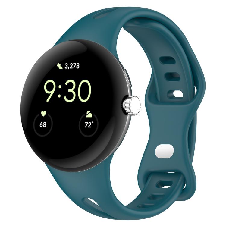 Teal silicone watch band fitted to a smartwatch, with adjustment holes and a loop buckle.