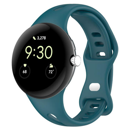 Teal silicone watch band fitted to a smartwatch, with adjustment holes and a loop buckle.