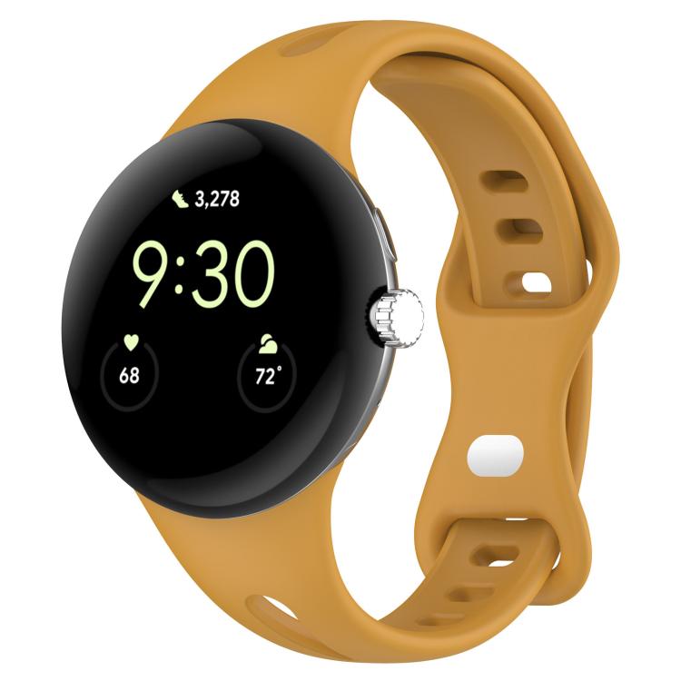 Mustard yellow silicone watch band fitted to a smartwatch, with adjustment holes and a loop buckle.