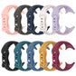Nine silicone watch bands in assorted colors, shown from the buckle side