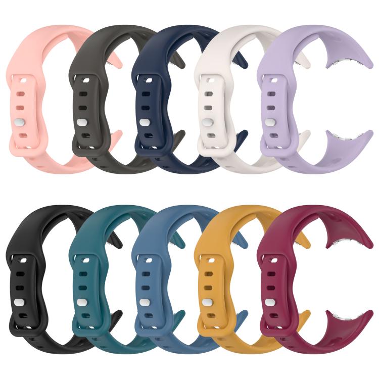 Nine silicone watch bands in assorted colors, shown from the buckle side