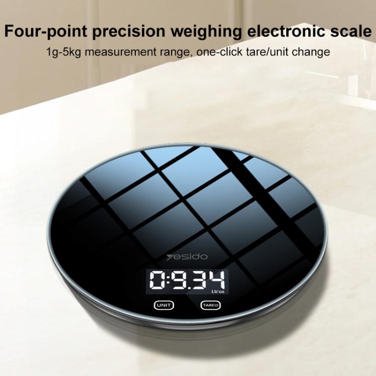 Round black smart kitchen electronic scale with dark grid glass top and LCD readout