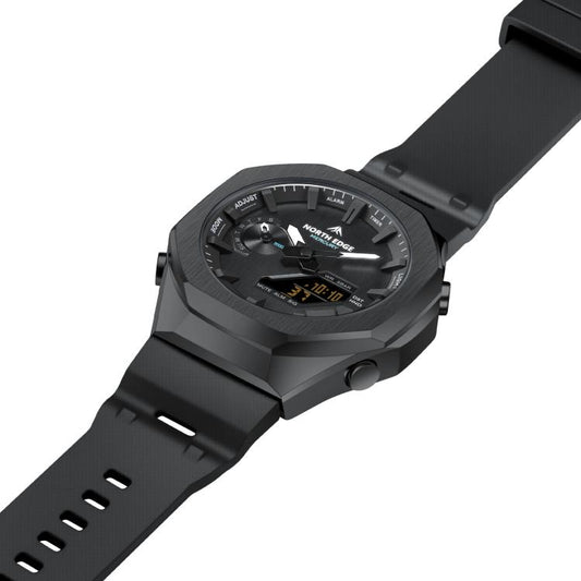 Black sports watch with digital face and wide rubber strap in side view