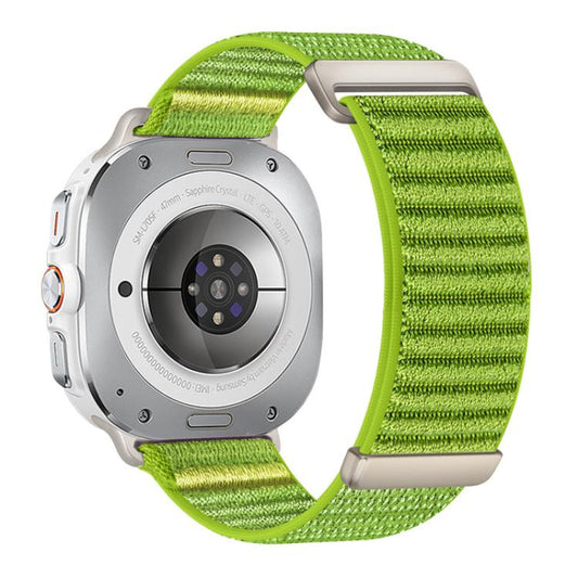 Bright green woven nylon watch band fitted to a silver smartwatch