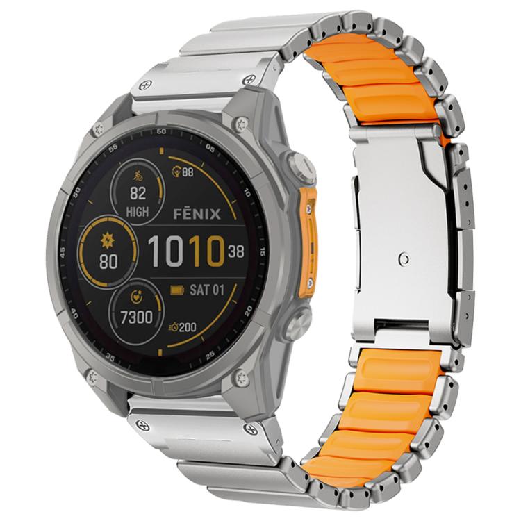 Silver-tone metal watch band with orange silicone panels, fitted to a Garmin watch.
