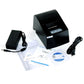 Black thermal receipt printer with power adapter, cables, and included papers