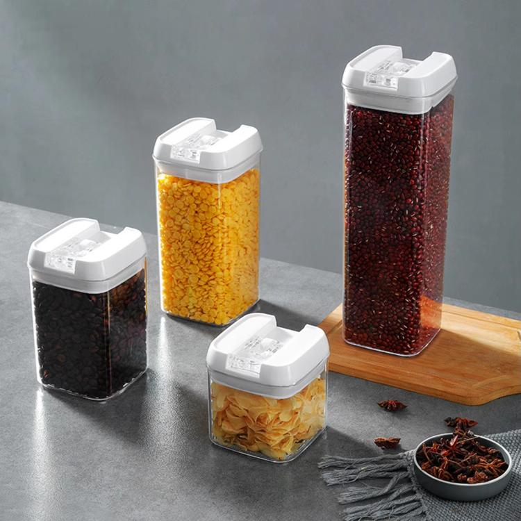 Food storage container set with clear jars and white lids, filled with grains and spices
