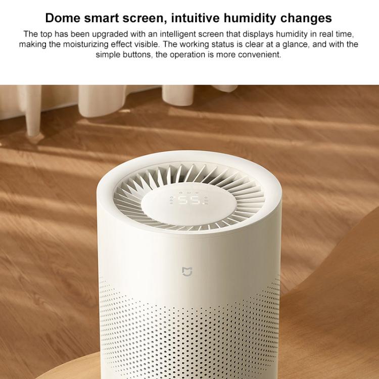White no-mist humidifier close-up with circular fan vents and small display