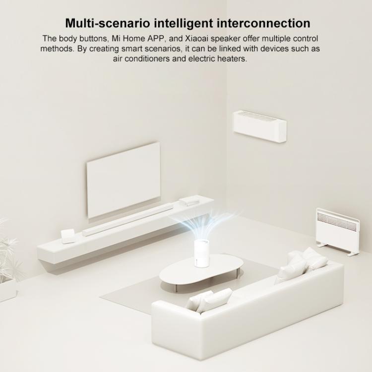White no-mist humidifier near furniture with vented top and front indicator