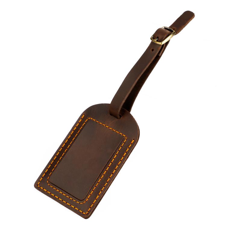 Brown genuine leather luggage tag with card pocket and buckled hanging strap, stitched border